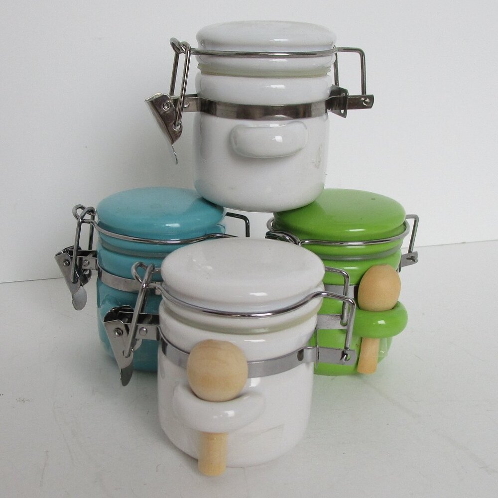 lot of miniature ceramic canisters